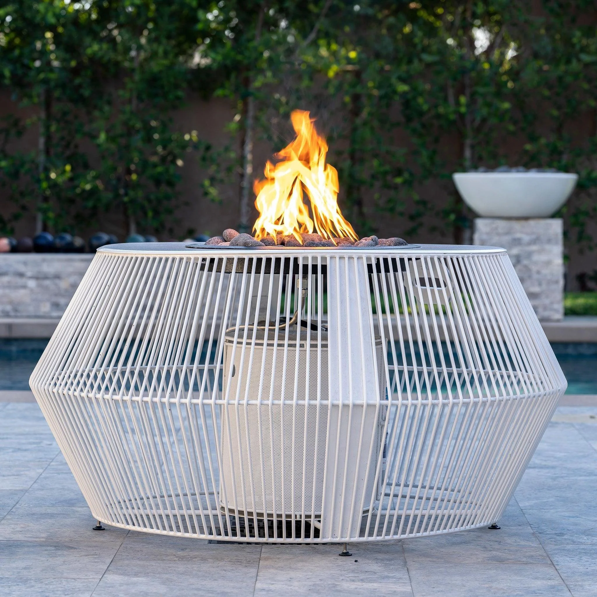 The Outdoor Plus Round Cesto 60" Black & White Powder Coated Metal Liquid Propane Fire Pit with Match Lit Ignition